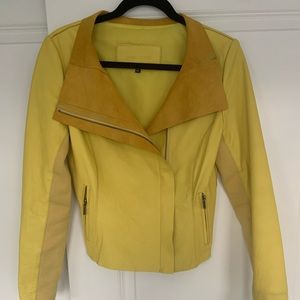Worn 2 times yellow  leather jacket .